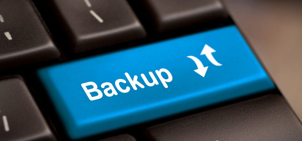 Backup Computer Key In Blue For Archiving And Storage